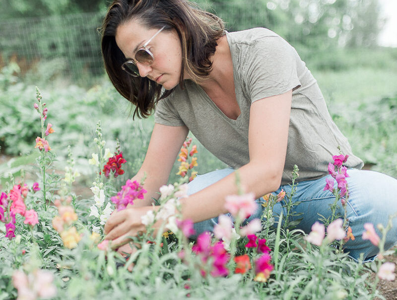 Alix in her garden on our farm. She loves to plant and grow edible flowers.