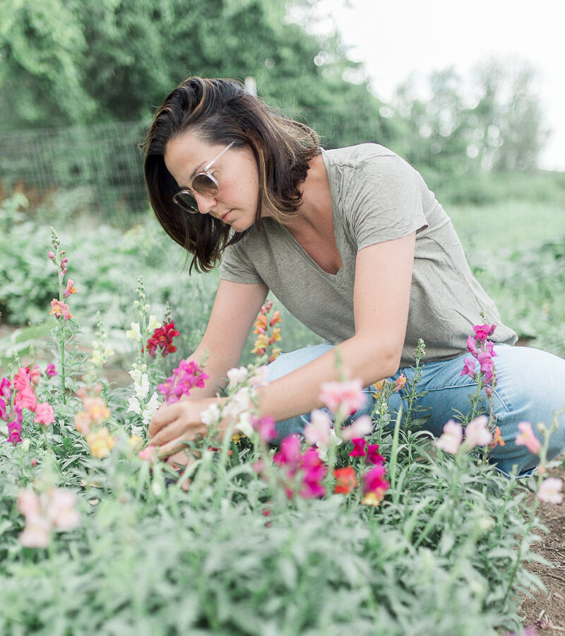 Alix in her garden on our farm. She loves to plant and grow edible flowers.
